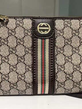 Gu..Brown GG Supreme Canvas Zip Clutch with Signature Web Stripe
